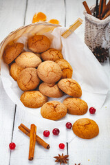 Homemade tangerine cookies on wooden rustic table. Close up