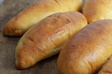 Healthy homemade fish bun on old wooden table. Home made bun