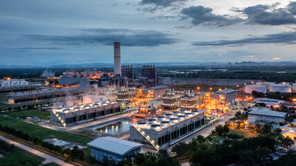 Aerial view power plant station electric plants station generator at dusk, Electrical power plant station during sunset, Electricity factory energy.