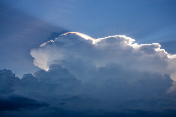 Rays of light shining through dark clouds for background