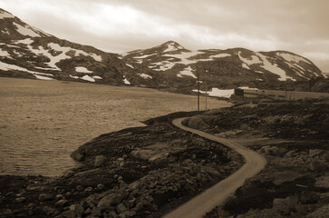 Views from the train window. Mountain tundra of Central Norway. Railway travel in Norway.The Bergen...