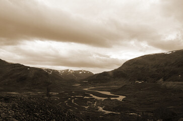 Views from the train window. Mountain tundra of Central Norway. Railway travel in Norway.The Bergen - Oslo train.