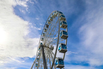 Helsinki ferris wheel against a bright blue sky