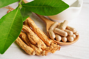 Ginseng roots and green leaf, healthy food.