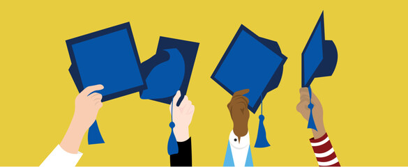 Hands of graduating students with mortar boards on yellow background