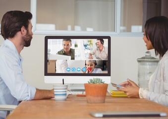 Side view of people during a visio call on computer