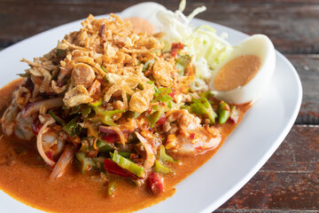 winged bean with shrimp salad on dish