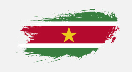 Free hand drawn grunge flag of Suriname on isolated white background