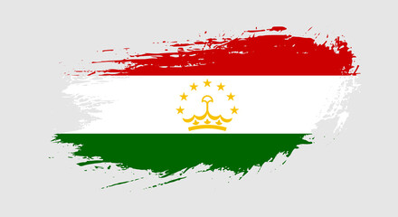 Free hand drawn grunge flag of Tajikistan on isolated white background