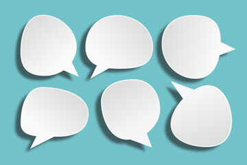 set of  white  speech bubbles  paper cut  on green background. Conceptual image about communication and social media, customer feedback