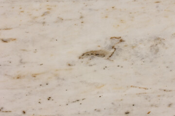 The front section of the granite rock is beige .
