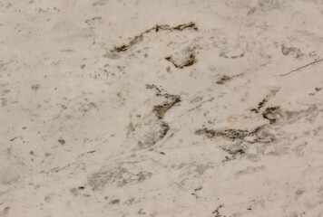 The front section of the granite rock is beige .