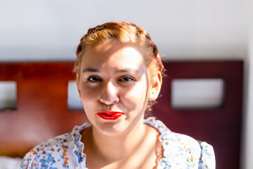 portrait of young hispanic woman in her 20s happy smiling. mexican