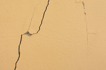 Broken concrete buildings, broken walls, small cracks