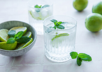 Iced cold lemonade with fresh lime and juice