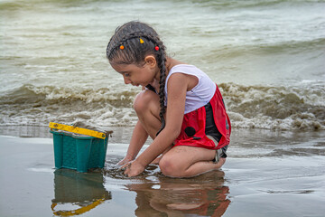 Children's game by the beach
