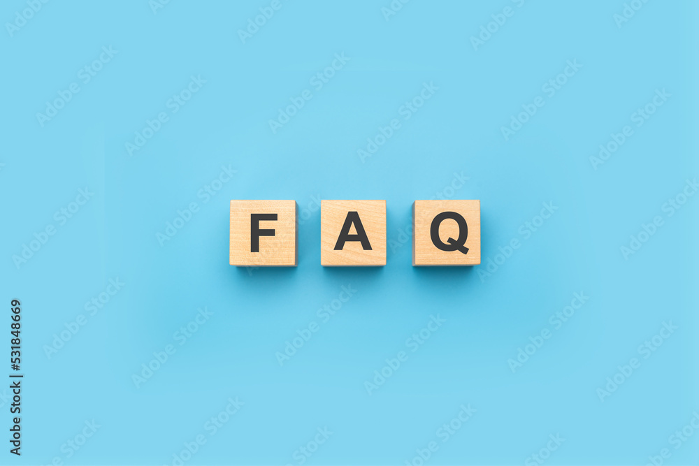 Poster faq frequently asked questions text on wooden cubes. blue background. information, problem and solut