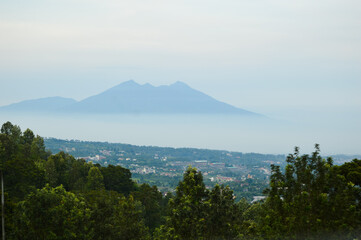 Obraz premium Puncak Pass, Bogor, Indonesia – Novemer 22, 2020, With Blured Background, Light Bokeh Background.