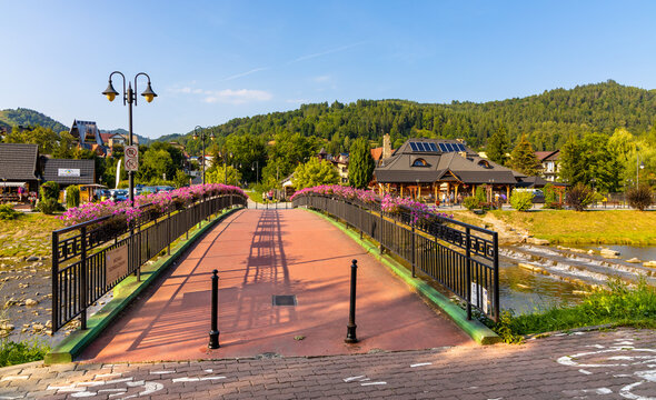 Most Michala Slowika Dzwona Bridge over Grajcarek creek in Szczawnica Zdroj springs resort in Pieniny Mountains in Lesser Poland