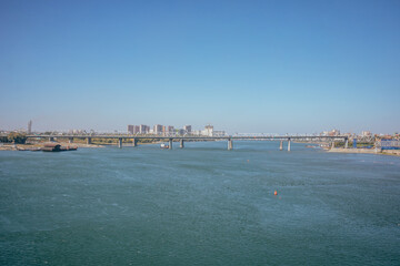 Novosibirsk. View from the Ob River from the Oktyabrsky Bridge. View of the Railway bridge. Beautiful river.