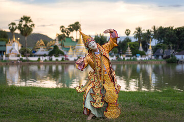 The classical Burmese traditional Dancing Mask perform show the cultural costume posing and wearing...