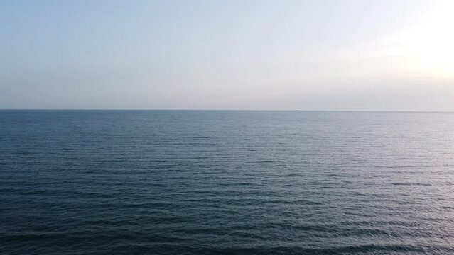 Ocean View Frame Fill during Golden Hour, Forward Aerial Flight.