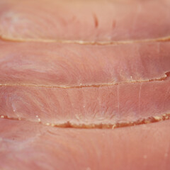 thin slices of Smoked tuna macro food background