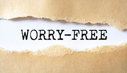 WORRY-FREE word written under torn paper.