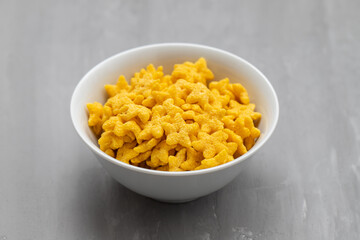 dry fresh corn stars in white bowl on ceramic