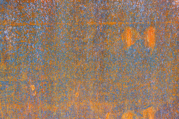 Rust on metal as a background. Corrosion on metal parts. Abstract composition for the design. Bright red rust.