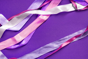 Wrapping ribbons on purple