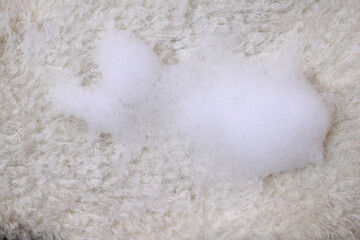 white foam to clean wool