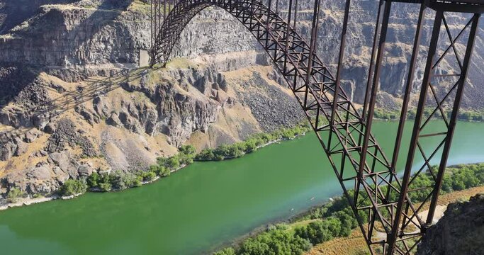 Twin Falls Idaho Perrine Bridge kayaks. Recreational sport of jumping from the bridge using a parachute to descend to Snake River shore. Low altitude skydiving.