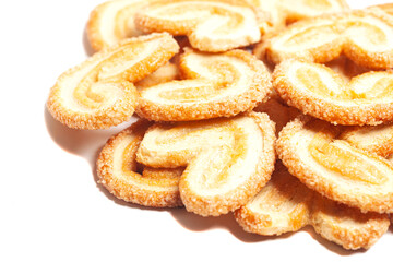 Heart-shaped cookies isolated on white background