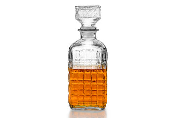 Whiskey in decorated crystal glass bottle, whisky or bourbon in vintage bottle isolated on white,...