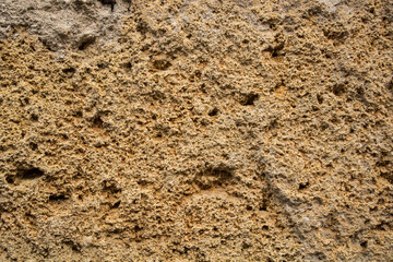evocative closeup texture image of a tuff wall
