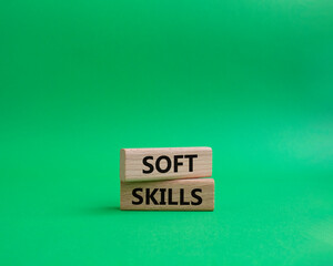 Soft skills symbol. Wooden blocks with words Soft skills. Beautiful green background. Business and Soft skills concept. Copy space.
