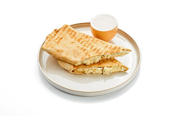 Cheese shawarma in a pita plate on a white background.