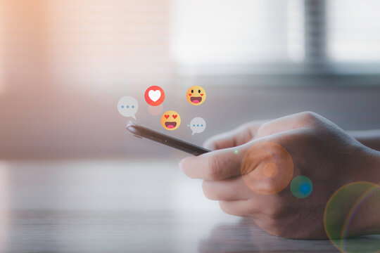 Social media and digital online on mobile phone. man using smartphone with social media to click love icon