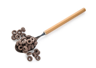Spoon with black cereal rings on white background