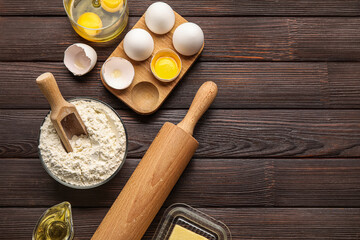 Ingredients for baking on wooden background