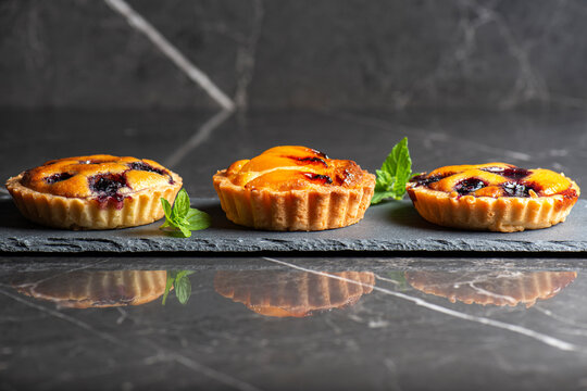 Fresh-made gourmet Blueberry and Apricot Frangipane Tarts