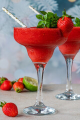 Frozen strawberry daiquiri with white rum garnished with fresh fruit