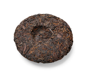 Dry pressed puer tea on white background