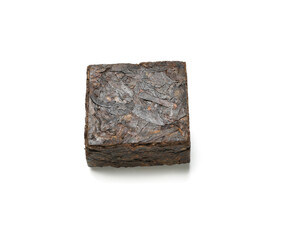 Dry pressed puer tea on white background