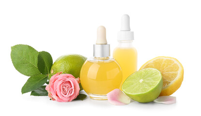 Bottles of citrus serum and fresh fruits on white background