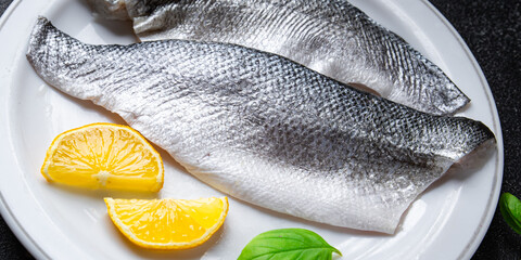 sea ​​bass fish fillet seafood healthy meal food snack diet on the table copy space food background rustic top view