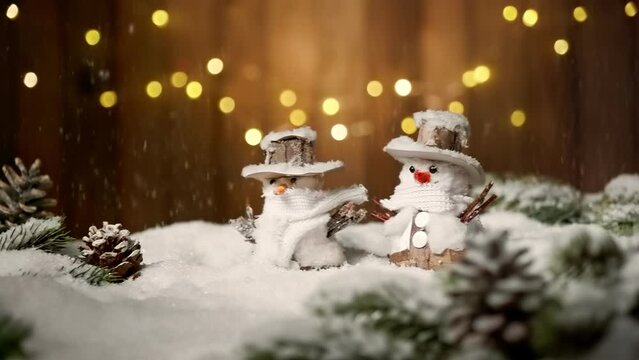 Ornamental snowman with festive wood background, lights and falling snow, footage for Christmas, New Year or winter

