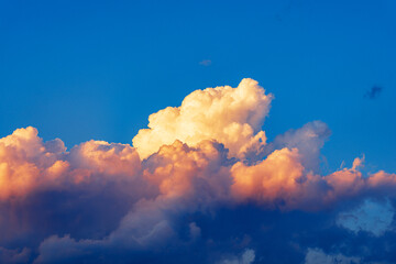 Photography of beautiful storm clouds, cumulus clouds or cumulonimbus at sunset. Full frame, sky...