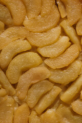 A freshly baked Apple Tart on a black background